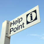 Help Point sign against a blue sky