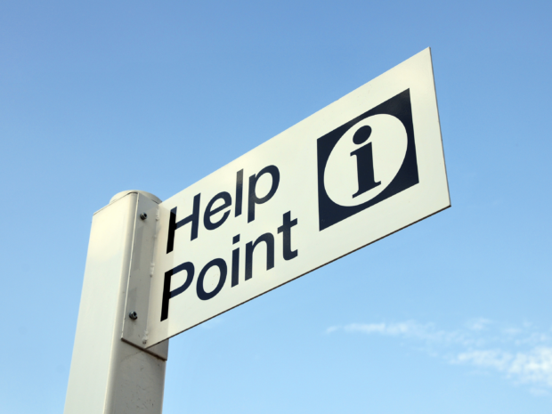 Help Point sign against a blue sky