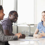 Smiling people in a team meeting