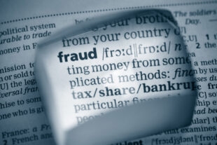 The word fraud highlighted on a document