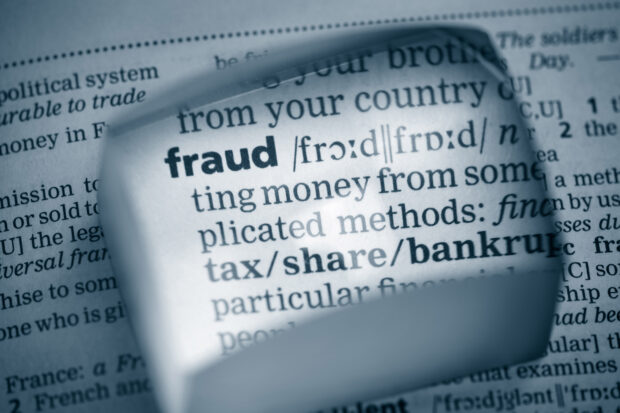 the word fraud highlighted on a document