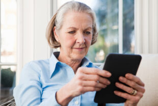 Woman reading electronic book