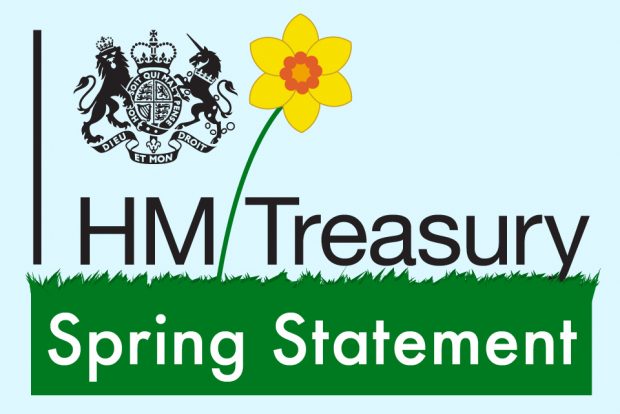 HM Treasury crest with an image of a daffodil growing out of grass against blue background